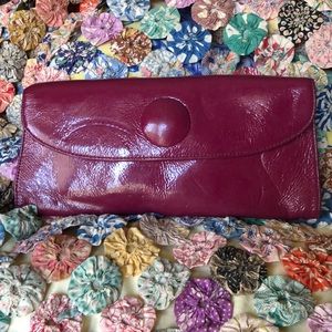 Maroon Hobo clutch with handle